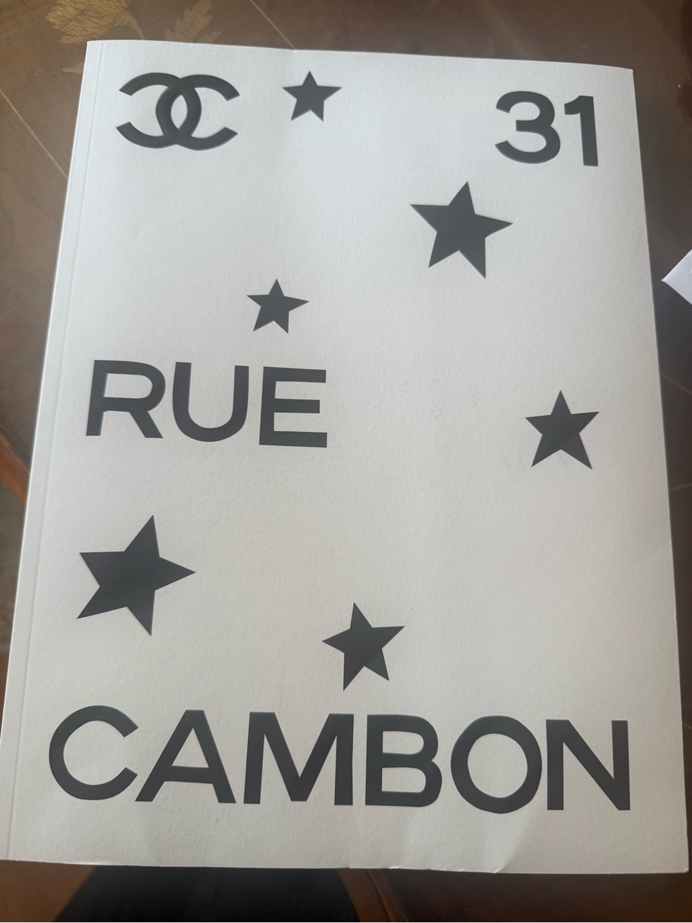 CHANEL Black Text on Cream Page Decorative Print